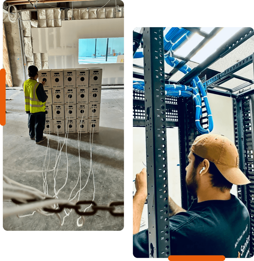 Technicians managing cables in construction site.